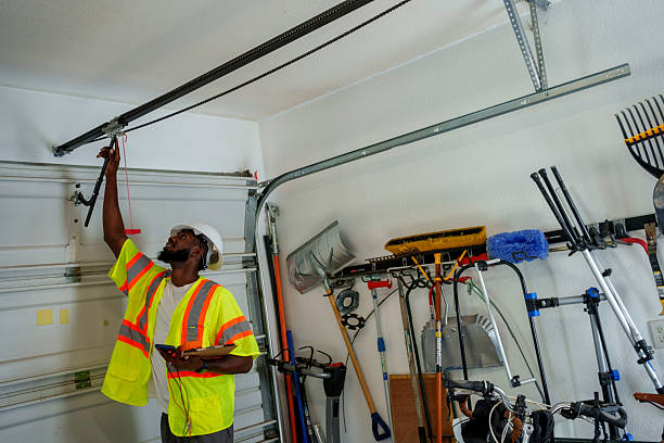 Professional Garage Door Spring Repair technician working in Cuyahoga County County, OH